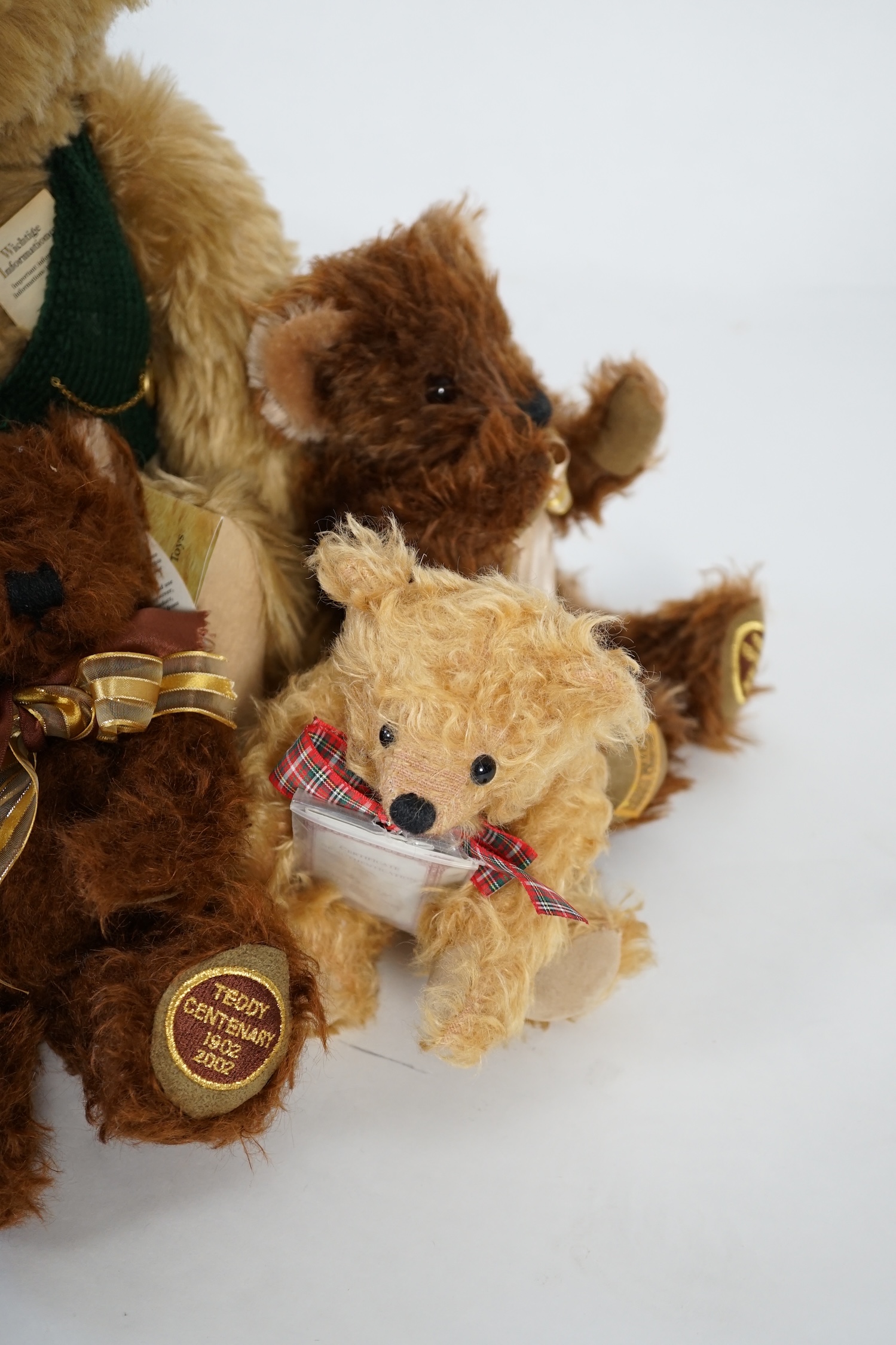 A large 1906 Steiff orange label, two Merrythought John Lewis bears, a black Merrythought bear, an artist bear and a Merrythought Alfred bear (6)